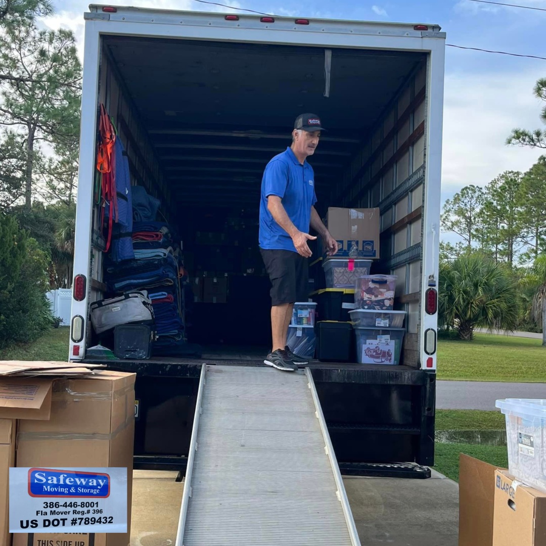 A man filling products on a truck